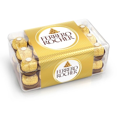 Ferrero Rocher chocolate with golden wrapping and hazelnut filling, displayed in a festive arrangement.