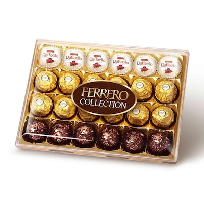 Ferrero Rocher chocolate with golden wrapper and hazelnut, displayed in a decorative box.