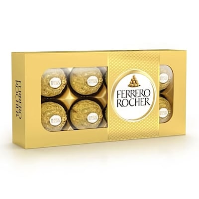 Ferrero Rocher chocolate hazelnut truffles in gold packaging, showcasing the iconic spherical shape and decorative foil.