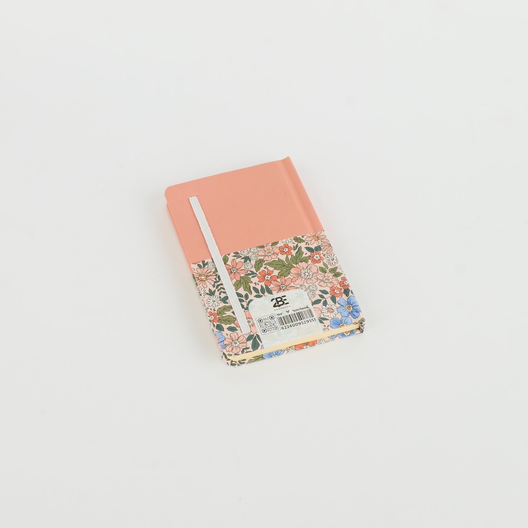 A6 floral notebook by 2BE featuring a vibrant flower pattern and a sturdy cover, ideal for journaling or notes.