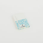 A6 floral notebook by 2BE featuring a colorful flower design on a textured cover.