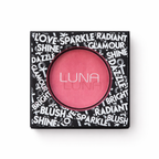 Luna blusher in a compact, showcasing a soft pink shade and included applicator for easy makeup application.