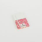 A6 floral notebook by 2BE with a vibrant flower design on the cover, showcasing its compact and stylish appearance.