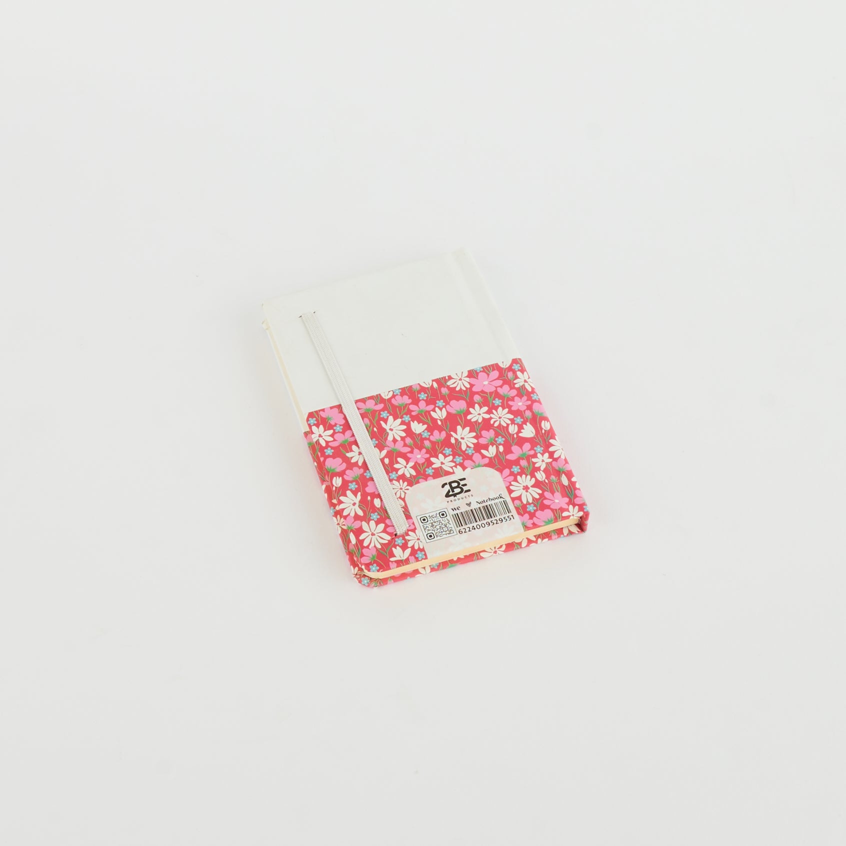 A6 floral notebook by 2BE with a vibrant flower design on the cover, showcasing its compact and stylish appearance.