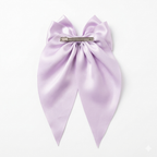 Givana elegant satin ribbon bow hair clip with a large decorative bow, perfect for adding a stylish touch to hairstyles.