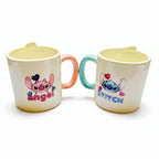 Givana Stitch & Angel couples mug set featuring two ceramic mugs with themed character designs on white background