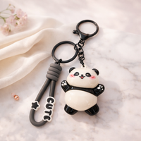 Cute Panda Pop keychain by Givana featuring four adorable designs, with a panda figure and colorful accents.