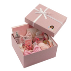 Givana Bestie Pinky Deluxe Gift Box with 16 pink gifts, perfect for friends, featuring colorful packaging and assorted small presents.