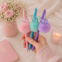 Givana Fluffy Charm Pen in vibrant colors with soft, plush exterior and sparkly charm details for a cute writing accessory.