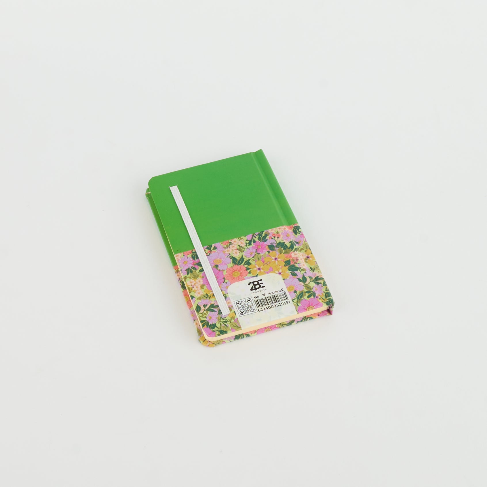 Floral A6 notebook by 2BE featuring a vibrant flower pattern on a soft cover, ideal for notes and sketches.