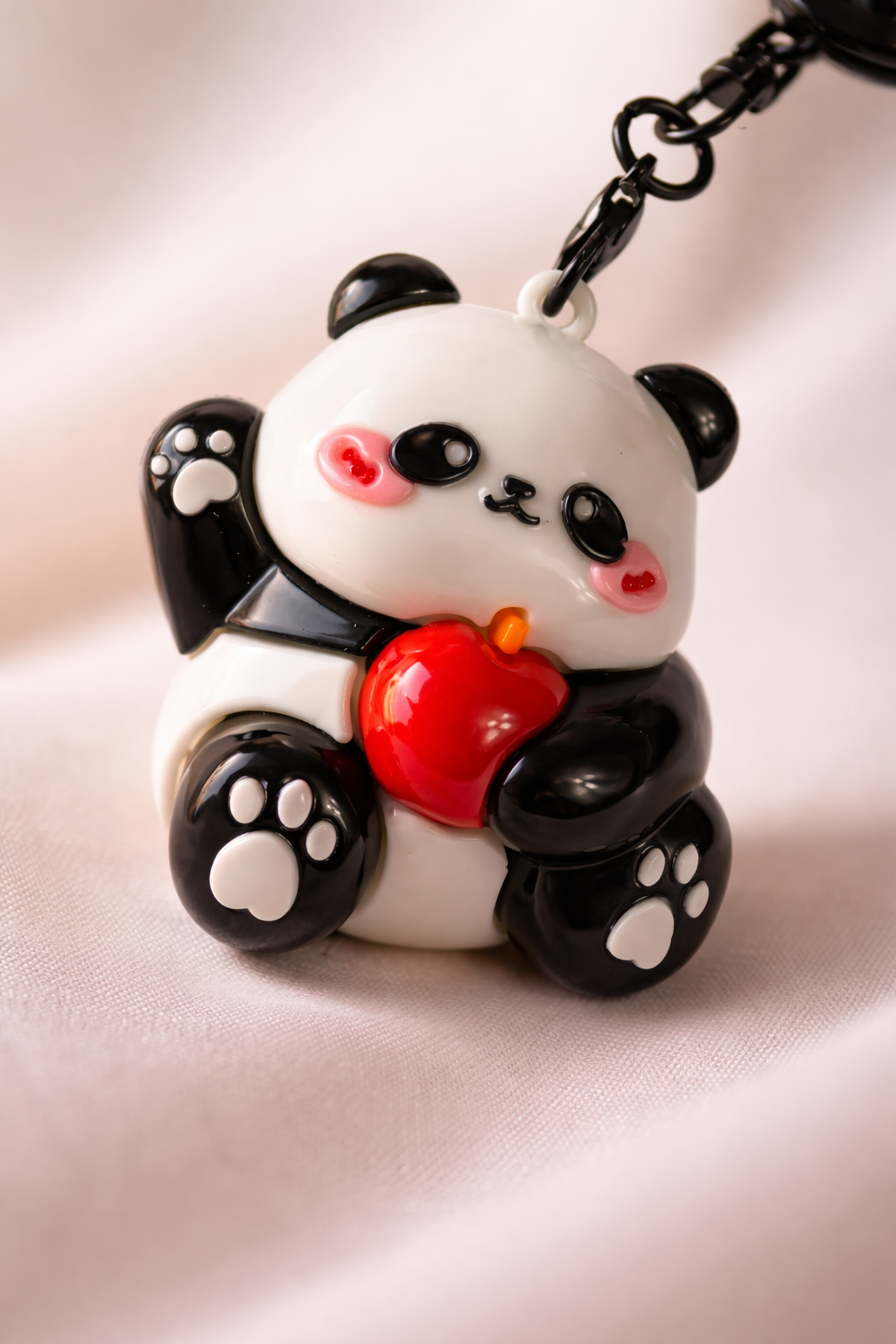 Givana Panda Pop keychain featuring a cute panda design, available in four charming styles, attached to a keyring.