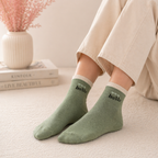 Givana Lucky Mood Socks in vibrant design with green accents, showcasing five unique sock patterns on a white background.