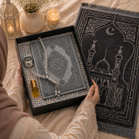 Gray Islamic Blessings Box by Givana with five gift items inside, featuring elegant packaging and intricate Islamic design.