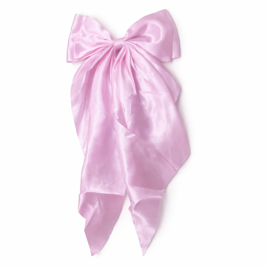 Givana bow hair clip featuring a decorative bow design in vibrant colors, perfect for styling hair.