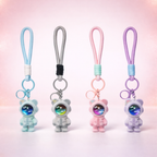 Givana Space Bear keychain in four colors featuring a cute bear design with star accents, perfect for key or bag decoration.