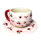 Givana mug and plate set featuring a modern design, showcasing a colorful mug beside an elegant matching plate.