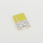 A6 floral notebook by 2BE featuring a colorful flower design on the cover and a compact size for easy portability.