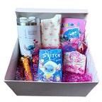 Pink Stitch & Angel Deluxe gift box by Givana, decorated with intricate designs and filled with thoughtful gift items.