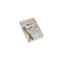 A6 floral notebook by 2BE featuring a colorful flower design on a textured cover.