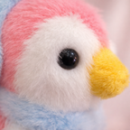 Givana fluffy penguin keychain in four colors, featuring soft plush fabric and a metal keyring for attaching to bags or keys.