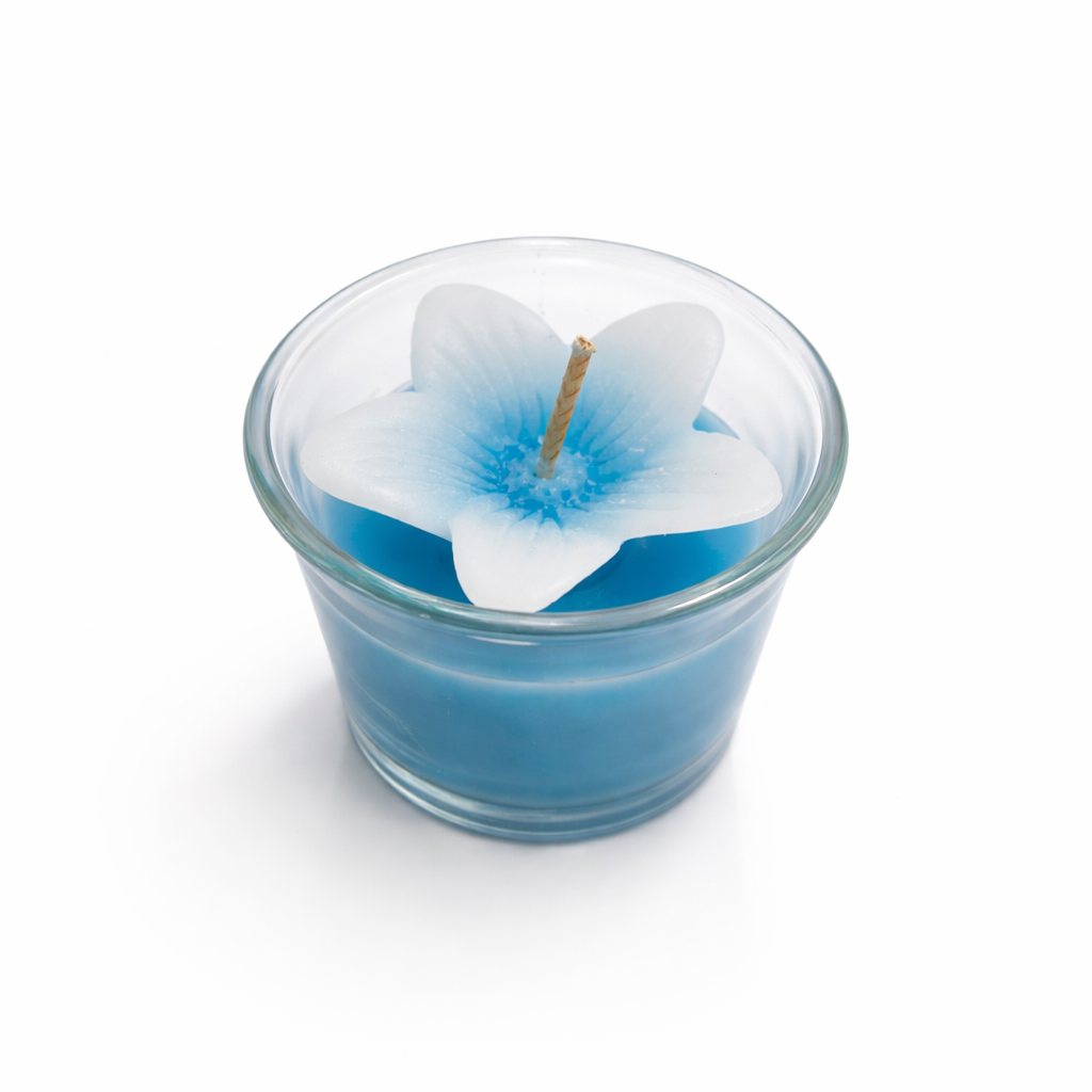 Givana Bloom Glow Mini Candle in six colors, featuring a small decorative candle with floral design and soft glow.