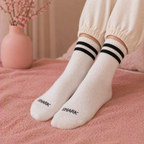 Givana Retro Vibe Crew Socks with colorful, vintage-inspired designs, shown in two different patterns on soft, stretchy fabric