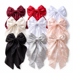 Elegant double-layer silk satin ribbon hair bow by Givana, featuring a soft, shiny finish and intricate bow design for stylish hair accessories.