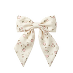 Givana patterned elastic hair tie with colorful fabric-covered ribbon for secure, stylish hair styling.