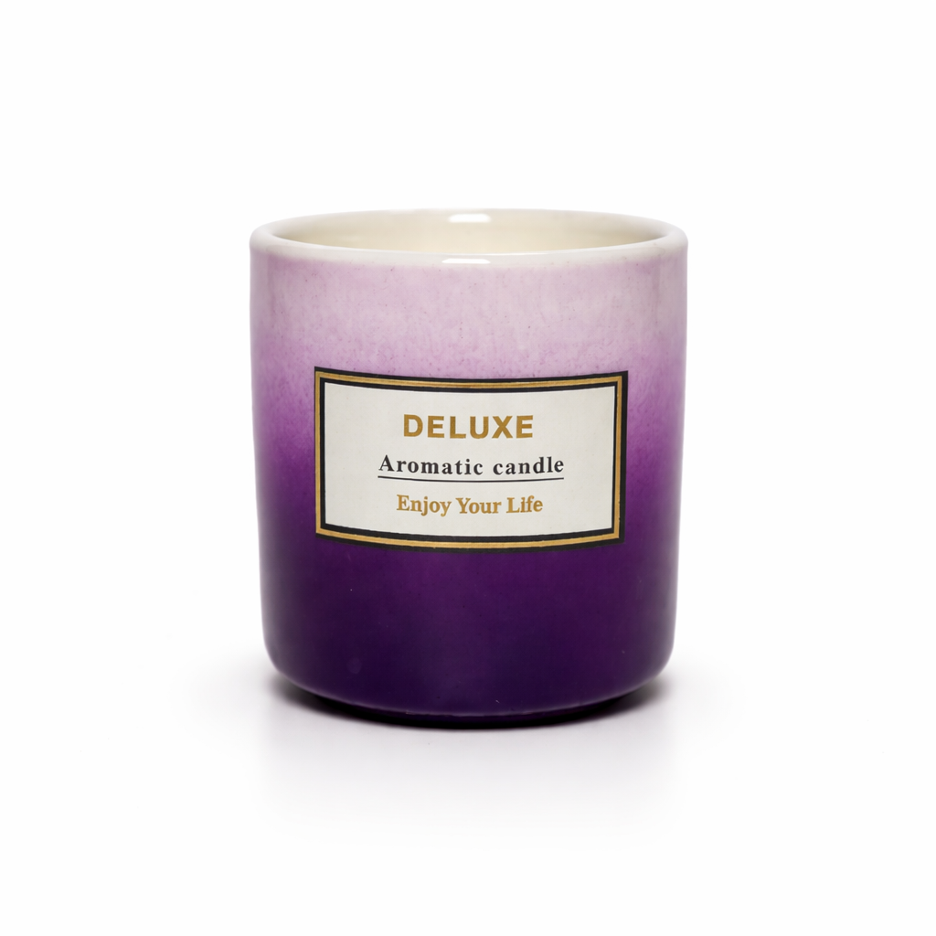 Givana DELUXE Aromatic Candle in two shades, featuring a glass container with a lit flame and elegant design.