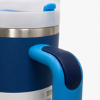 Givana Stanley Glow Tumbler mug in six colors featuring a glow-in-the-dark design and a sleek, durable shape.