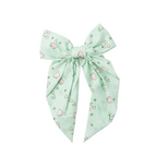 Givana patterned elastic hair tie with colorful woven design, stretchy and suitable for securing hair comfortably.