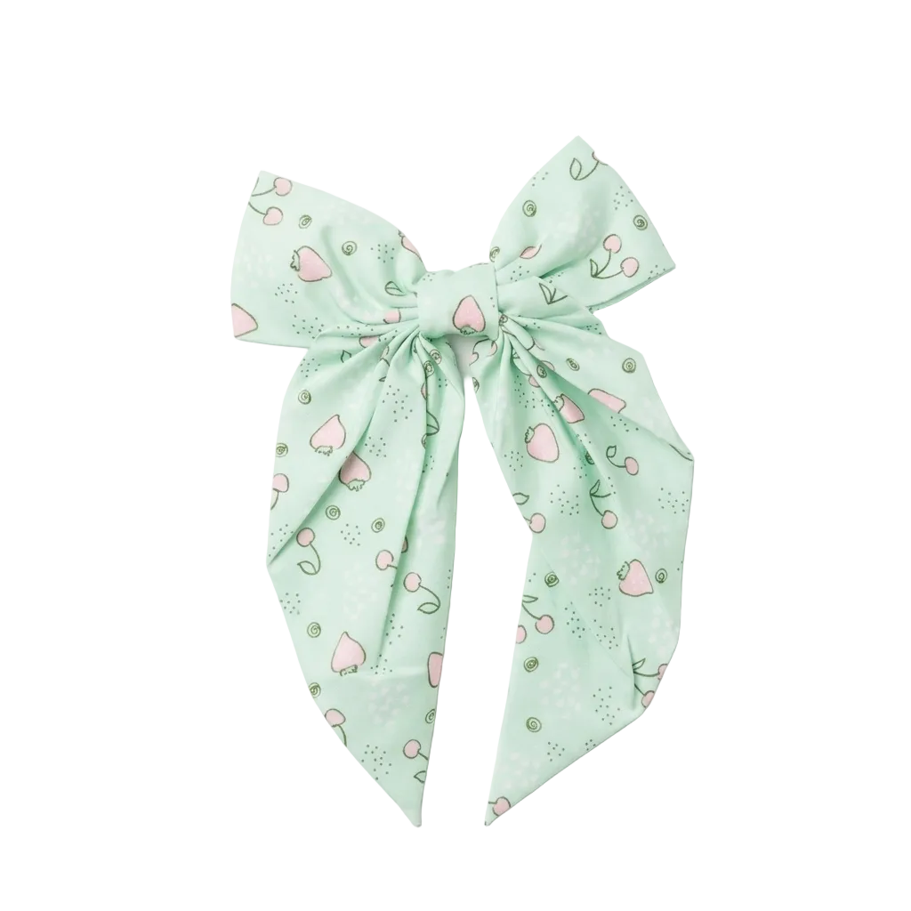 Givana patterned elastic hair tie with colorful woven design, stretchy and suitable for securing hair comfortably.