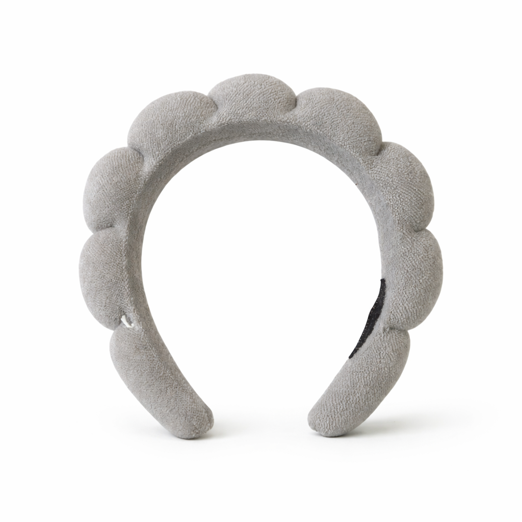 Givana Puffy Spa Skincare Headband in soft pink, made of plush fabric, designed to keep hair away during skincare routines