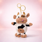 Cute plush cow keychain with golden clasp from Givana, featuring a soft, adorable cow charm for bags and keys.