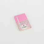 A6 floral notebook by 2BE featuring a vibrant flower design on the cover, perfect for notes and sketches.