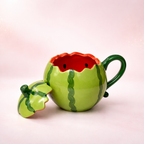Givana Melon Mood Mug with bright green and pink melon design, ceramic coffee mug for hot beverages, cheerful and playful style.