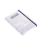 Seasons notebook A5 by 2BE, hardcover with colorful seasonal illustrations, open to show lined pages for writing.