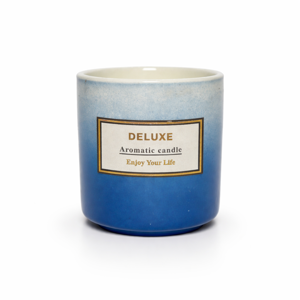 Givana Deluxe Aromatic Candle in two shades with a warm glow and elegant design, perfect for creating a cozy atmosphere.