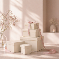 Off-white Givana gift box with colorful fillers arranged inside, ready for presenting a special gift.