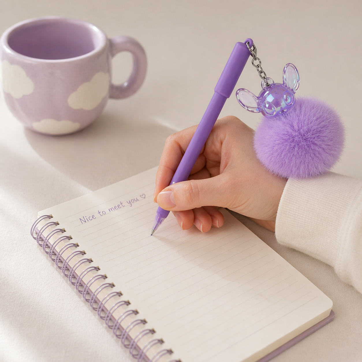 Givana fluffy charm pen in five colors with a soft, plush charm and sleek pen body for stylish writing and decoration.